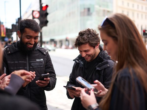 People playing a treasure hunt in Manchester