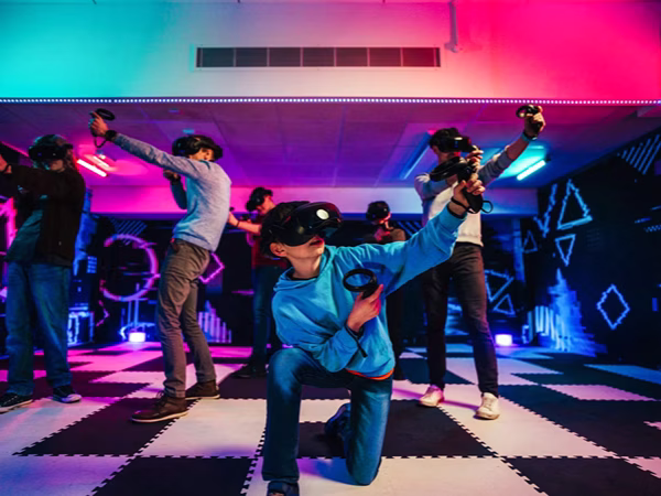 Family wearing VR headsets playing a VR experience in London