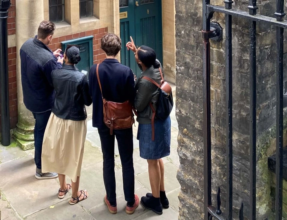 Players solving clues and visiting quirky locations in London and York