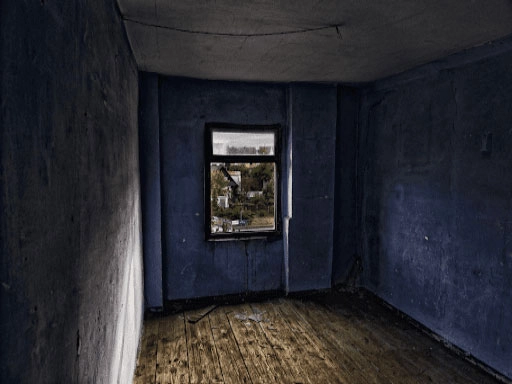 Empty, abandoned room with a window used for murder mystery games.